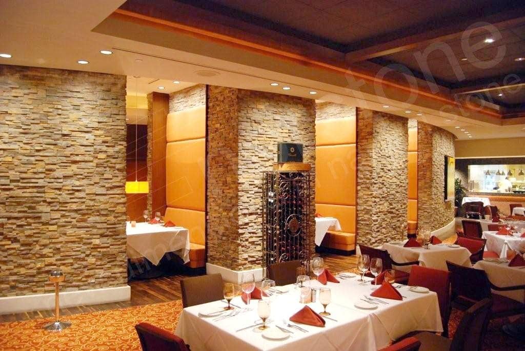 Norstone Ochre Rock Panels used extensively through the main dining area of Farraday's steakhouse in Pompano Beach